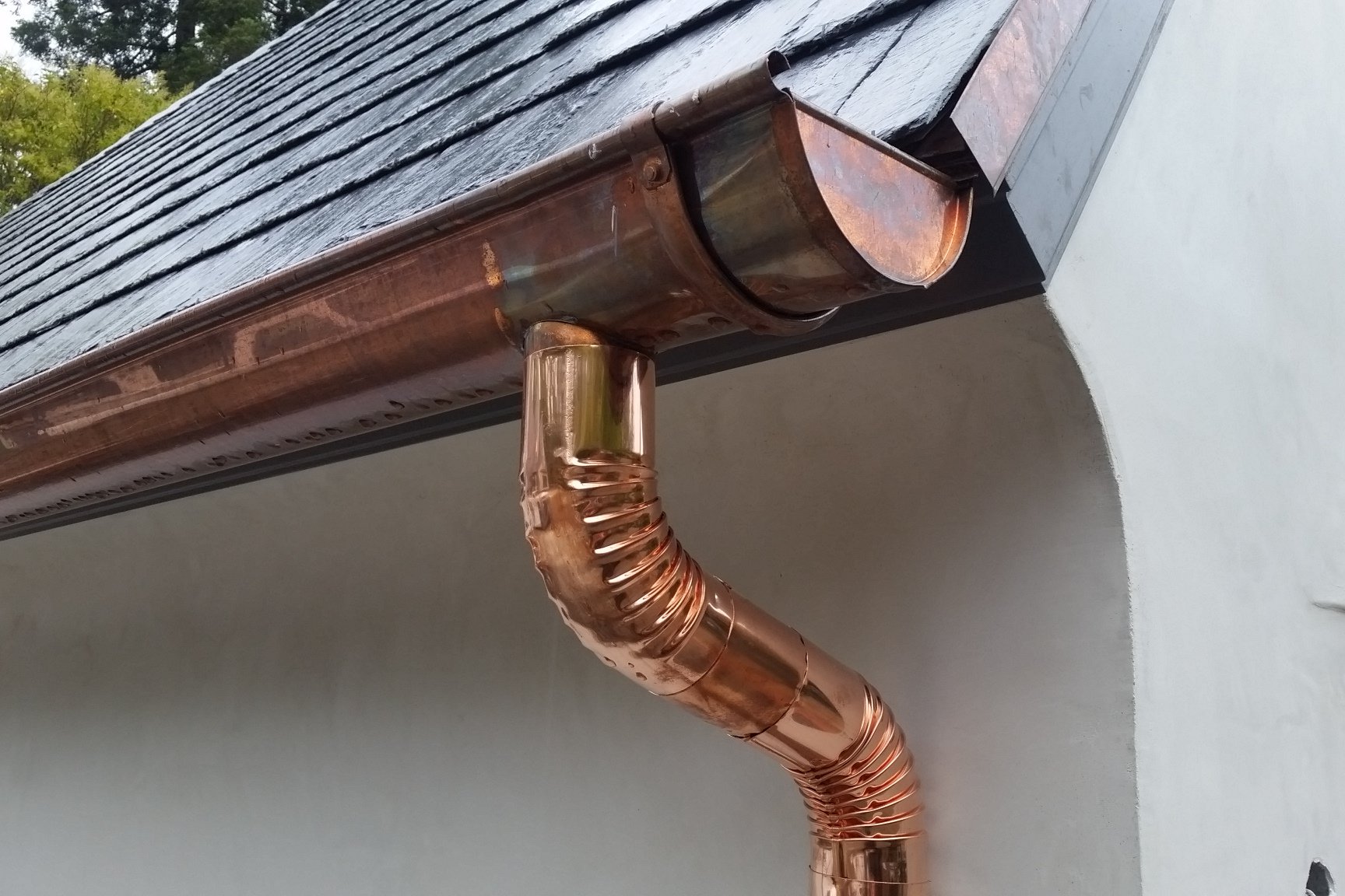 Copper gutters and downspouts detail shot