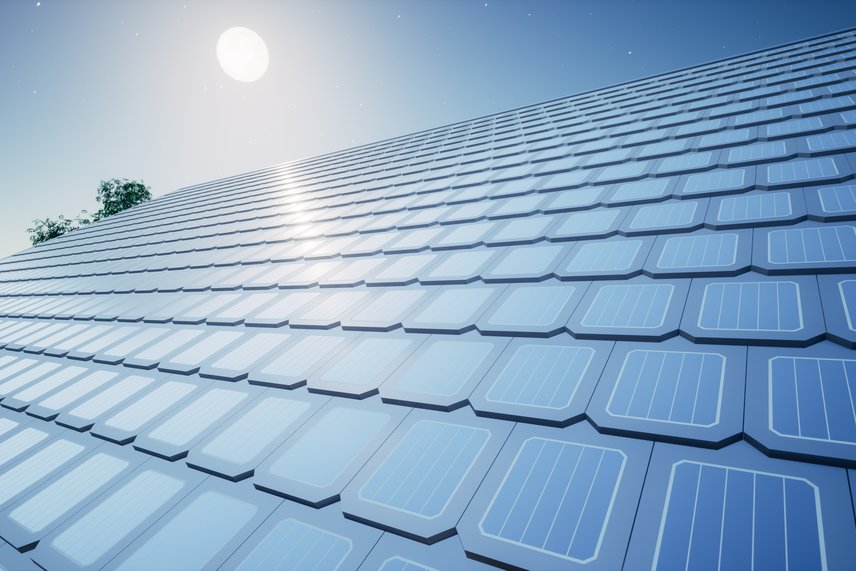Solar shingles installed on a roof, blending with standard shingles
